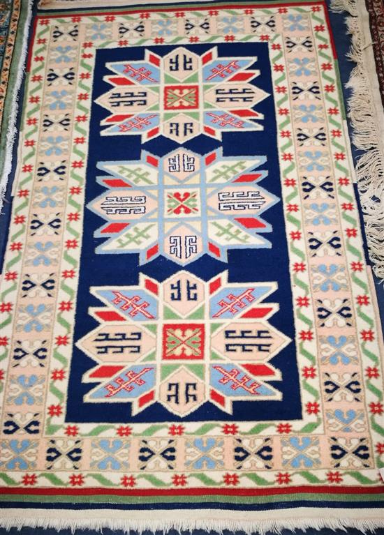 A Caucasian blue ground rug 156 x 92cm